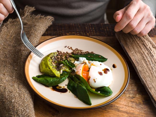 An example breakfast on the Keto diet is poached eggs and sauteed spinach.