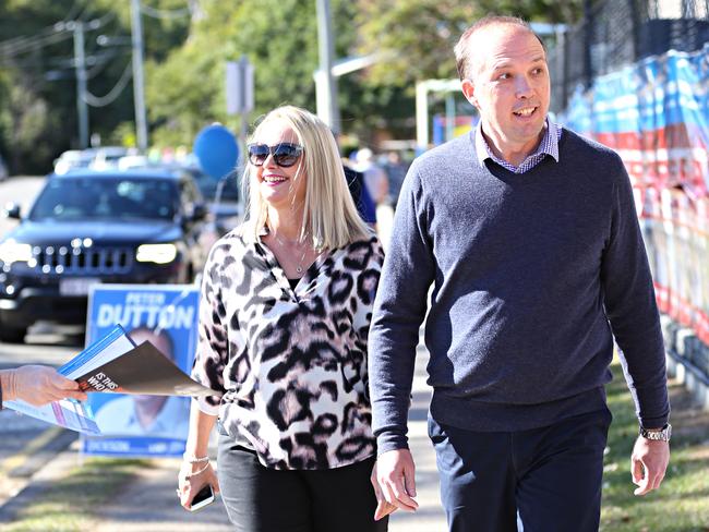 Voting with his wife Kirilly at Albany Creek state school in 2016. Picture: Annette Dew