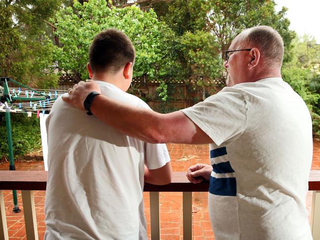 Pictured at his home in Cambridge Park is carer Eddie with foster child James . James has had difficulty finding a family that will take him.Picture: Richard Dobson