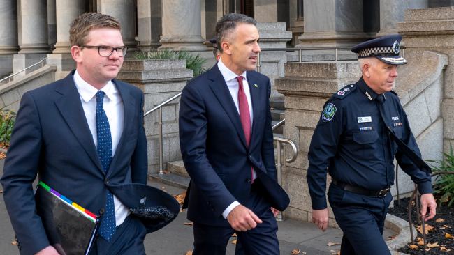 (L-R) Minister for Health Chris Picton, Premier Peter Malinauskas and Police Commissioner Grant Stevens following the removal of South Australia's COVID-19 emergency declaration. Picture: NCA NewsWire / Naomi Jellicoe
