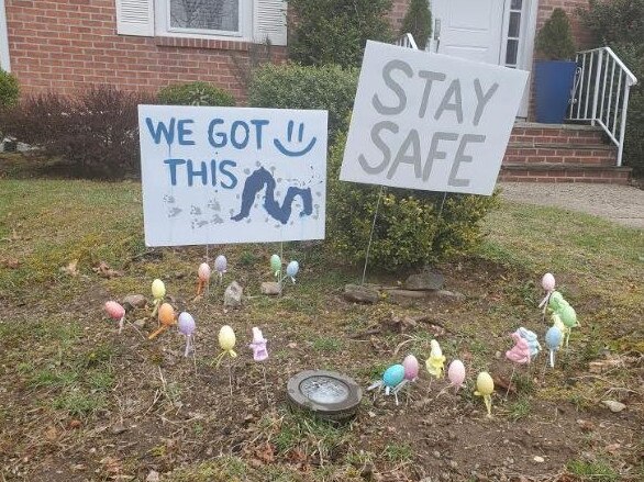 A sign in a suburban New York yard encouraging people to stay safe during COVID-19. Picture: Nathan Vass