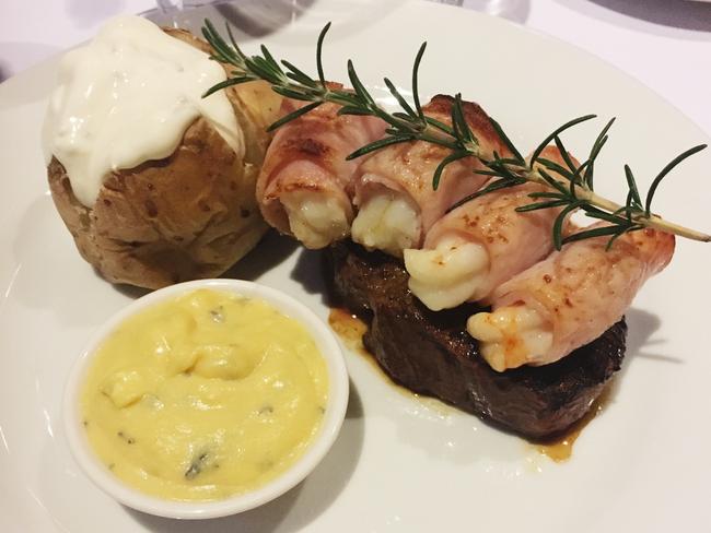 Fillet steak, Morton Bay bugs &amp; prawns wrappe in bacon with béarnaise sauce at the Cork &amp; Cleaver