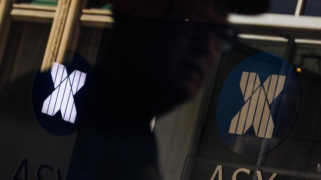 SYDNEY, AUSTRALIA - NewsWire Photos, October 29 2024. GENERIC. Stocks. Finance. Economy. People walk past the Australian Stock Exchange, ASX, on Bridge Street. Picture: NewsWire / Max Mason-Hubers