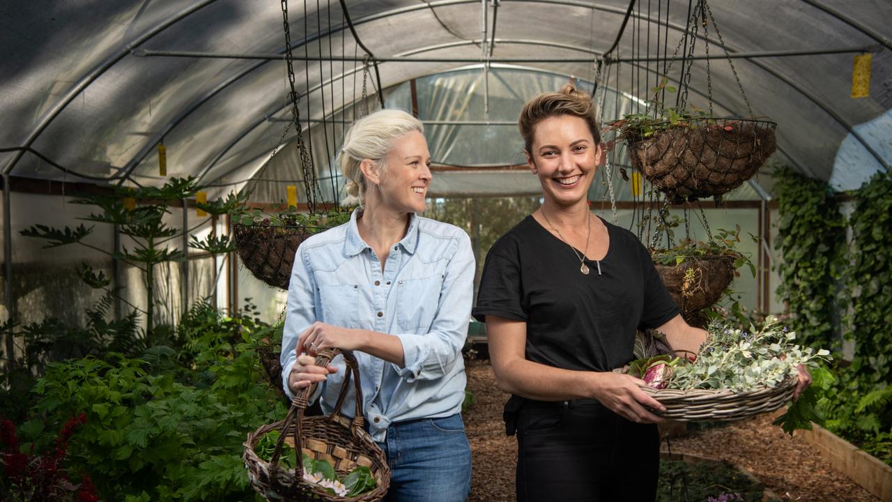 Star chef Alanna Sapwell with Danielle Gjestland collecting produce at a farm in Pomona for her pop-up restaurant Esmay on the Noosa river. Picture: Brad Fleet