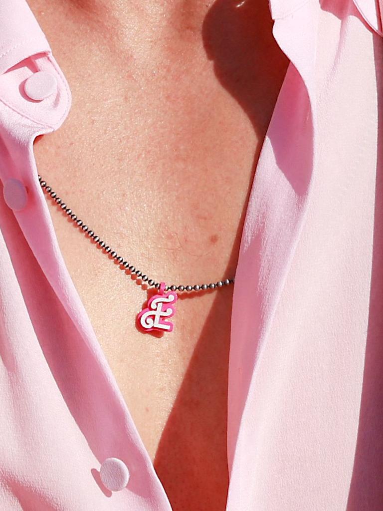 This Ken doll only has eyes for one gal -- Eva! #RyanGosling paid tribute  to his wife by donning a necklace with her initial on it to the