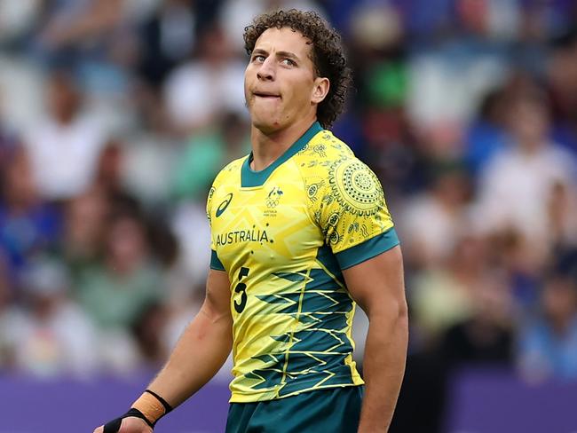 PARIS, FRANCE - JULY 24: Mark Nawaqanitawase #5 of Team Australia looks on during the Men's Rugby Sevens Pool B Group match between Australia and Kenya on Day -2 of the Olympic Games Paris 2024 at Stade de France on July 24, 2024 in Paris, France. (Photo by Cameron Spencer/Getty Images)