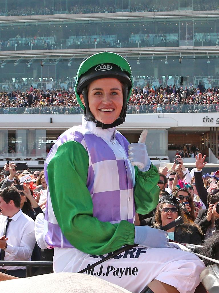 Michelle Payne celebrates after riding Prince Of Penzance in the 2015 Melbourne Cup. (Photo by Scott Barbour/Getty Images)