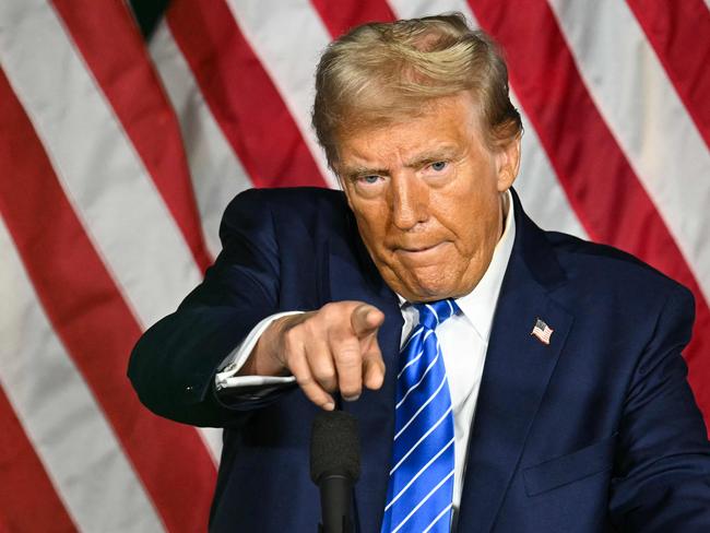 TOPSHOT - Former US President and Republican presidential candidate Donald Trump speaks during a campaign event at Discovery World in Milwaukee, Wisconsin, October 1, 2024. (Photo by Jim WATSON / AFP)