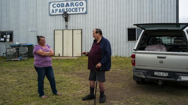 Volunteer Cassie King and David Handran-Smith at the Cobargo Bushfire Relief Centre. Picture: Sean Davey.