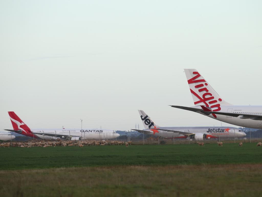 Plane car park. Qantas, Jetstar and Virgin aircraft mothballed at Avalon Airport, Geelong, during the COVID-19 shutdown. Picture: Alan Barber