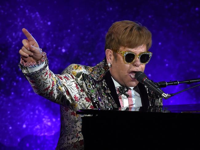 At a special event in New York, Elton John performed two songs before announcing he intends to retire from touring. Picture: AFP/Timothy A. Clary