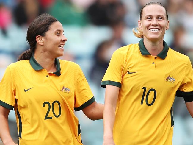 SYDNEY, AUSTRALIA - NOVEMBER 27: Sam Kerr (L) and Emily Van Egmond (R) of the Matildas interact during game one of the series International Friendly series between the Australia Matildas and the United States of America Women's National Team at Stadium Australia on November 27, 2021 in Sydney, Australia. (Photo by Matt King/Getty Images)