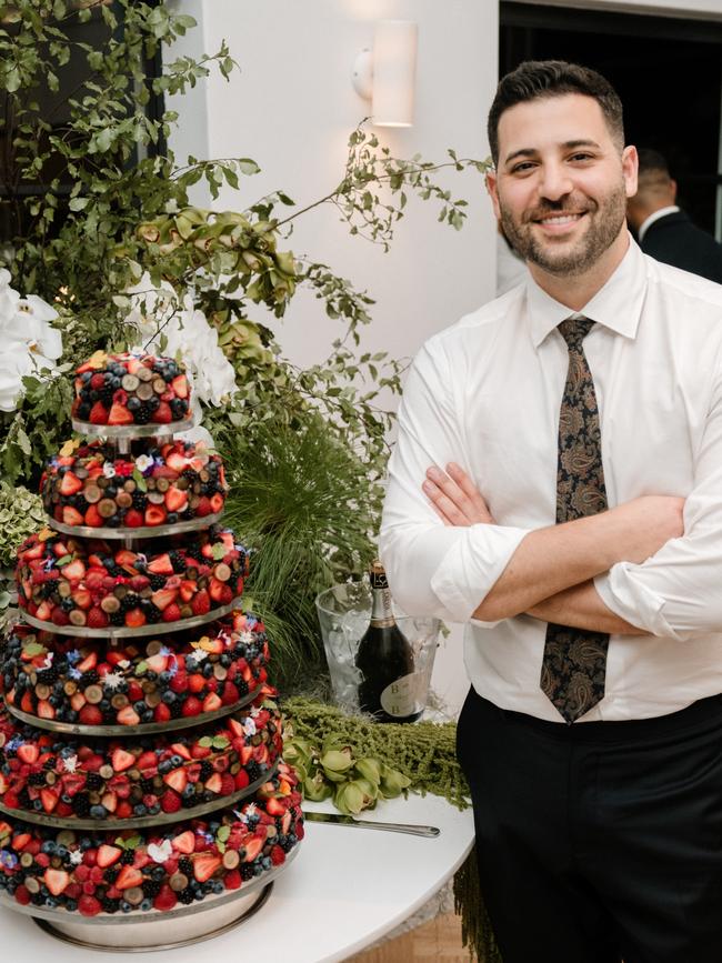 Harrods' head pastry chef Philip Khoury at his brother Alan's wedding with the berry-coated cake.