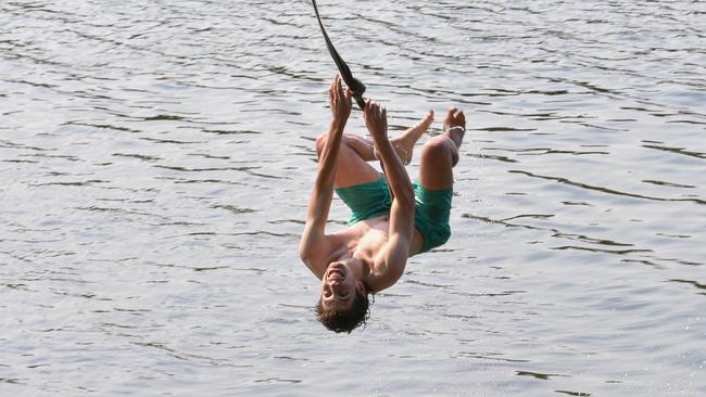 Dean McNeilage cooling off at Tench Reserve on the Nepean River on Friday. Picture: Flavio Brancaleone