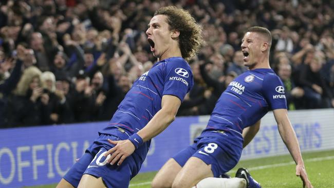 Chelsea's David Luiz, left, celebrates after scoring his side's second goal during the English Premier League soccer match between Chelsea and Manchester City at Stamford Bridge in London, Saturday Dec. 8, 2018. (AP Photo/Tim Ireland)