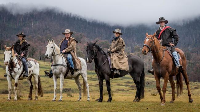 Phil, Cara, Louuise and Antony Maguire attempt to rein in wild brumbies on their property near Mt Bundara ahead of Parks Victoria's brumby cull. Picture: Jake Nowakowski