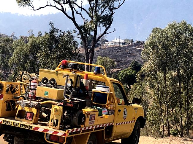 Looking out over the Mt Archer foothills where strike crews fight to control the North Rockhampton fires
