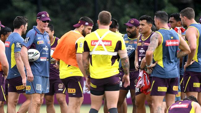 Coach Wayne Bennett addresses Broncos players during a training session in the lead-up to their Round 2 clash with the Cowboys. Photo: Bradley Kanaris