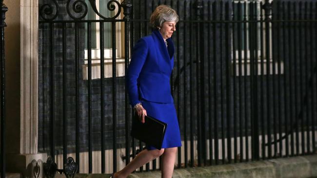 Theresa May leaves 10 Downing Street to meet the press yesterday. Picture: AFP