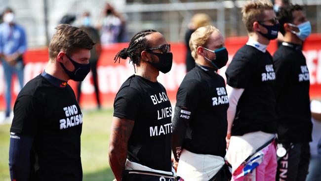 Drivers stand for the national anthem before the race. Picture: Getty Images