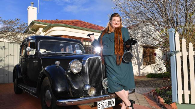 Roxann Legg with her Rover P3 75 Four Door Saloon with sunroof in her driveway at Plympton. Picture: Mark Brake