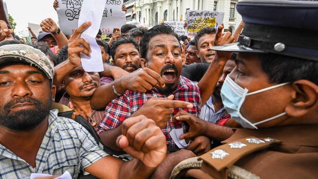 Desperate Sri Lankans, especially the poor, are protesting in the streets. Picture: AFP