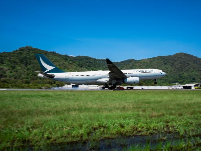 The Cathay Pacific A330 arrives at Cairns International Airport.