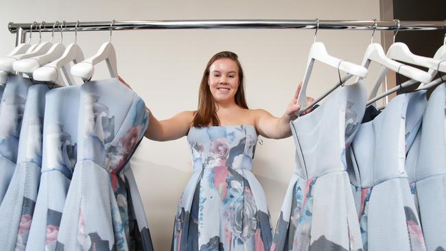 Brown wearing her most popular dress, the Nicholas Painted Floral Mesh Ball Gown. Picture: Adam Ward