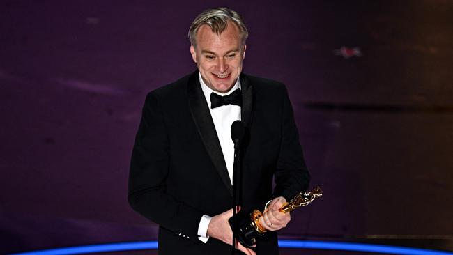 British director Christopher Nolan accepts the award for Best Director for "Oppenheimer" onstage during the 96th Annual Academy Awards at the Dolby Theatre in Hollywood, California on March 10, 2024. (Photo by Patrick T. Fallon / AFP)