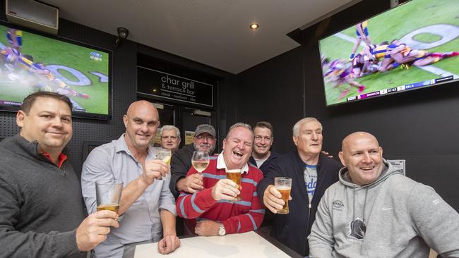 A lucky few Broncos fans watching the game with legend Michael Hancock at the Caxton Hotel on Thursday night.