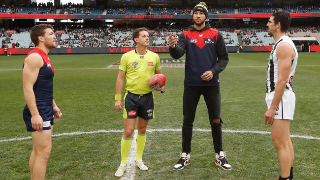 Simmons did the coin toss for weekend match between the Melbourne Demons and the Collingwood Magpies. Picture: Michael Willson/AFL/Getty