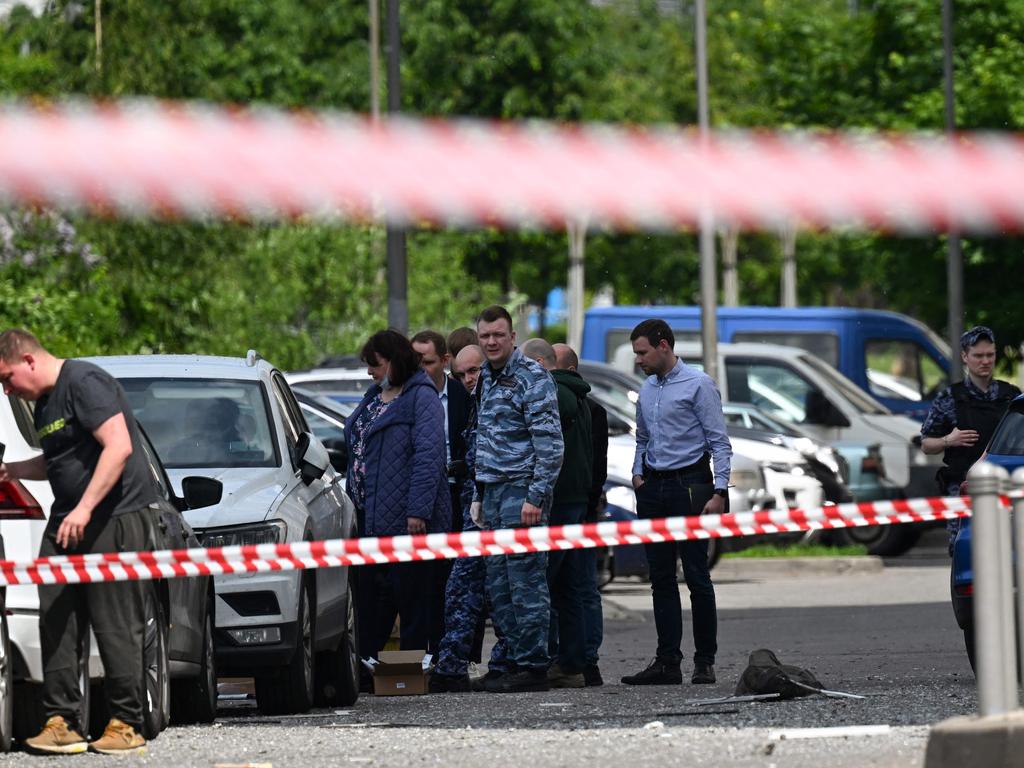 Police outside a damaged multi-storey apartment building after a drone attack in Moscow on May. Picture: AFP