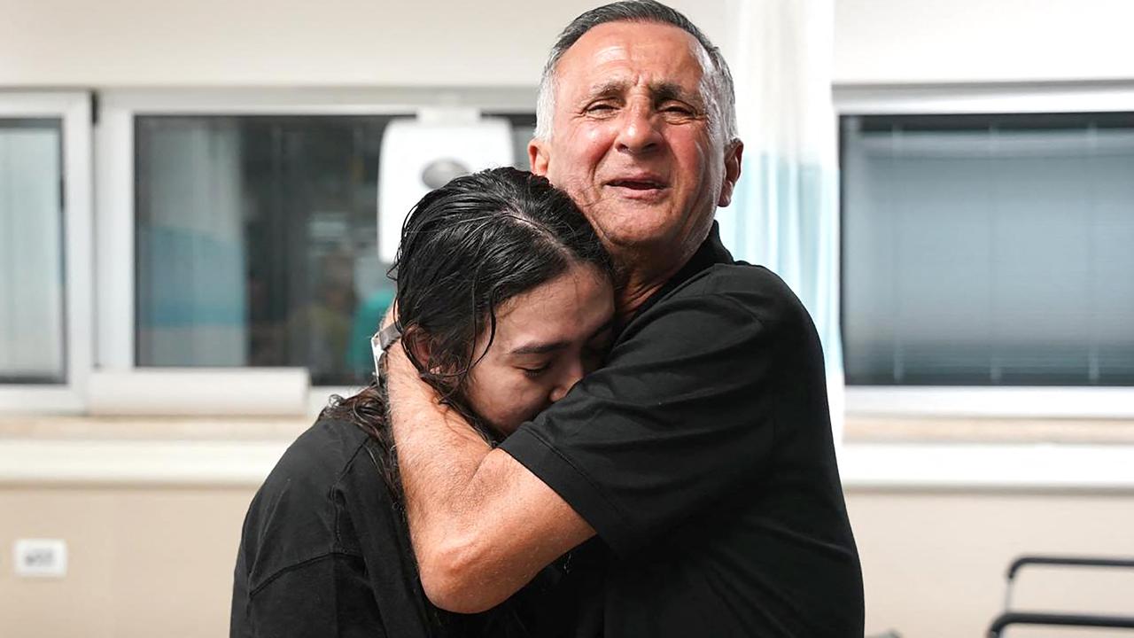 An emotional Noa hugged her dad Yaakov after finally being freed from Hamas’ captivity. Picture: Israeli Army / AFP