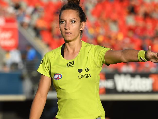 Umpire Eleni Glouftsis during the Round 11 AFL match between the Gold Coast Suns and the West Coast Eagles at Metricon Stadium in Carrara on the Gold Coast, Saturday, June 3, 2017. (AAP Image/Dave Hunt) NO ARCHIVING, EDITORIAL USE ONLY