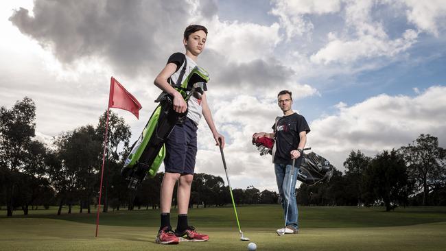 Strathallan Golf Club members Oscar Brazzale, 14, and his father Danny fear the course will be sold to developers. Picture: Jake Nowakowski