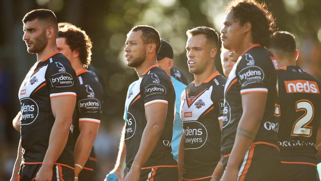 SYDNEY, AUSTRALIA - APRIL 11: Wests Tigers players look dejected after a Cowboys try during the round five NRL match between the Wests Tigers and the North Queensland Cowboys at Leichhardt Oval, on April 11, 2021, in Sydney, Australia. (Photo by Matt King/Getty Images)