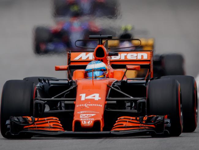 KUALA LUMPUR, MALAYSIA - OCTOBER 01: Fernando Alonso of Spain driving the (14) McLaren Honda Formula 1 Team McLaren MCL32 on track during the Malaysia Formula One Grand Prix at Sepang Circuit on October 1, 2017 in Kuala Lumpur, Malaysia.  (Photo by Lars Baron/Getty Images)