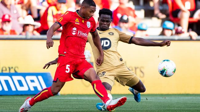 Michael Maria and Mohamad Adam battle for the ball. Picture: Daniel Kalisz/Getty Images