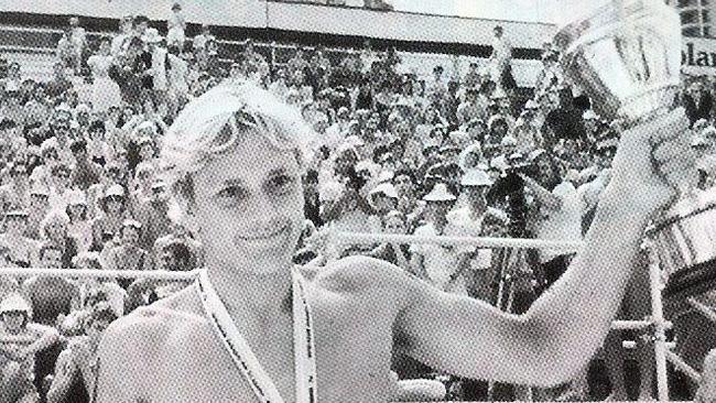 The 1984 Coolangatta Gold winner Guy Leech with his medal and trophy at Coolangatta beach.