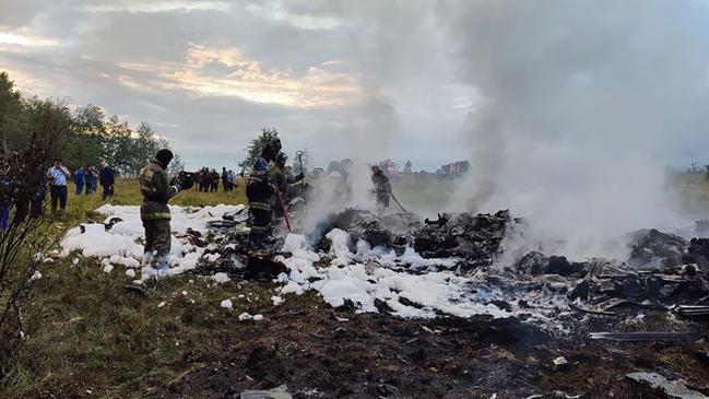 Rescuers work at the site of the plane crash near the village of Kuzhenkino, Tver region. Picture: Russian investigative committee / AFP.