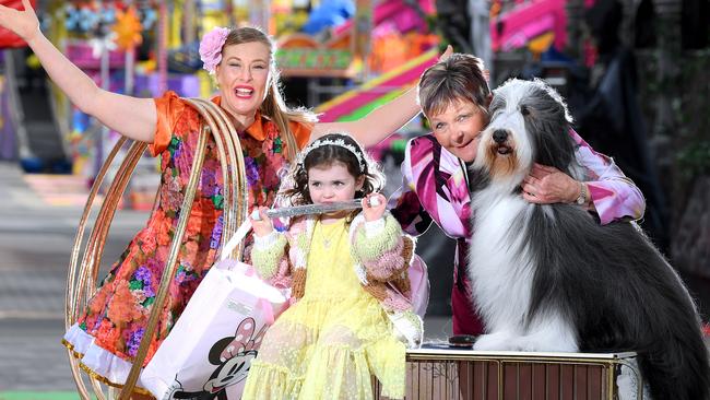 Eloise Green the Hula Queen, Ivy Goodwin, 3, with showbags and Heather McMaster with her show dog Moses the bearded collie. Picture Mark Brake