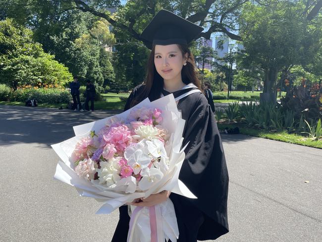 Vivien Kang Madiam graduates with a Bachelor of Commerce at the 2024 University of Melbourne graduations. Picture: Himangi Singh