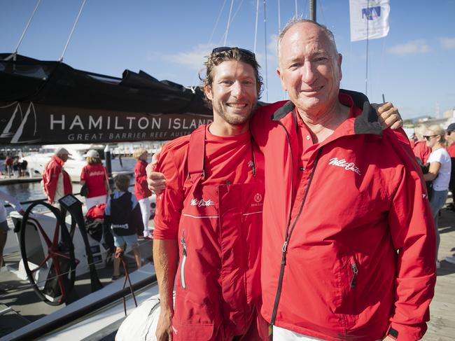 Daniel Oatley, The late Bob Oatley's grandson, in Hobart after steering Wild Oats across the line, pictured with  his uncle owner Sandy Oatley. Wild Oats XI skippered by Mark Richards claims a 9th line honours victory in the 2018 Sydney to Hobart Yacht Race. The yacht crossed the line in 1d 19hrs 7mins 21secs  . Picture: RICHARD JUPE