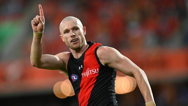 Nick Hind celebrates kicking a goal during last year’s AFL season. His career came to an end after being delisted by Essendon. Photo by Albert Perez/AFL Photos via Getty Images