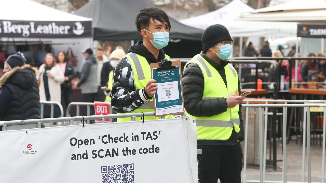 Tasmania's Own Market/Salamanca Market with some people wearing masks and people using the check in Tas app to register attendance. Picture: Nikki Davis-Jones