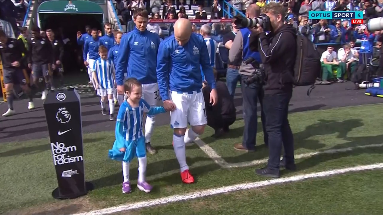 Aaron Mooy and Bella walk out for Huddersfield's clash with Leicester