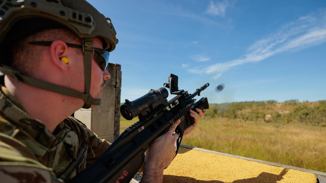 An Australian Army soldier from the 2nd Cavalry Regiment fires the SL40 grenade launcher attachment at the Townsville Field Training Area on 01 June, 2022. Picture: SGT Andrew Sleeman