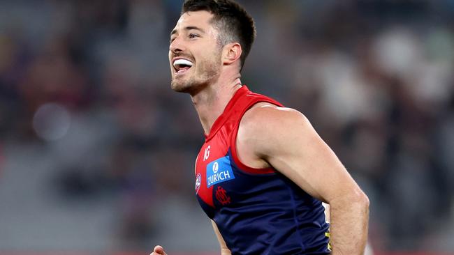 MELBOURNE, AUSTRALIA - AUGUST 10: Alex Neal-Bullen of the Demons celebrates kicking a goal during the round 22 AFL match between Melbourne Demons and Port Adelaide Power at Melbourne Cricket Ground, on August 10, 2024, in Melbourne, Australia. (Photo by Josh Chadwick/Getty Images)