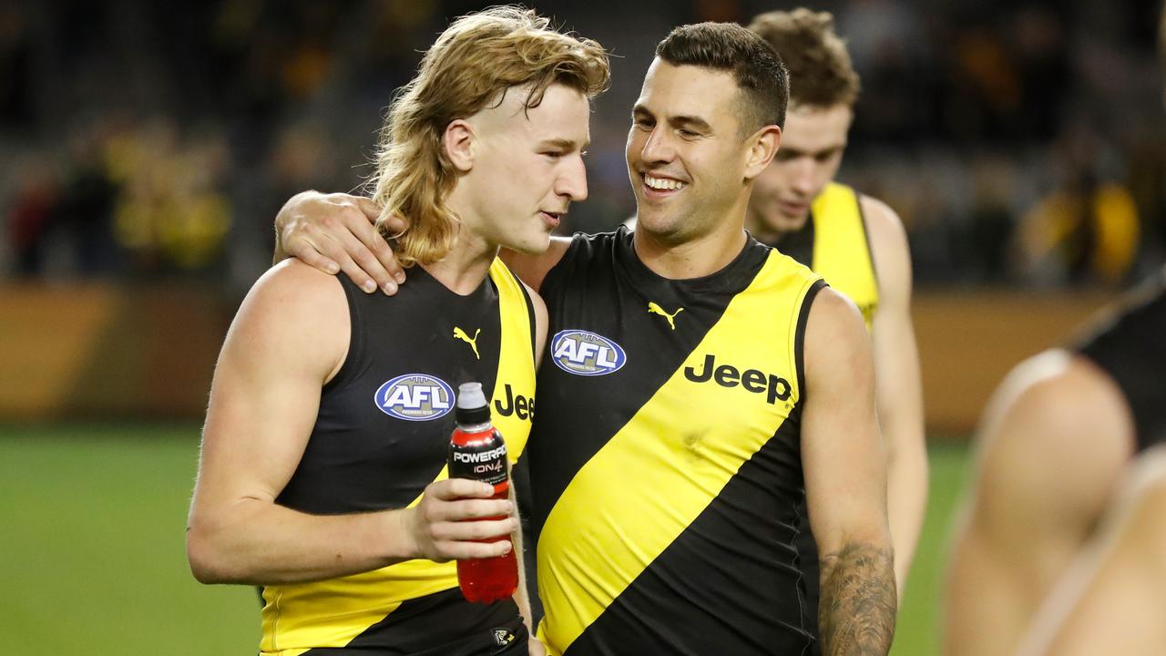 Jack Graham (right) resisted interest from rival clubs to remain at Richmond. Picture: Michael Willson/AFL Photos via Getty Images