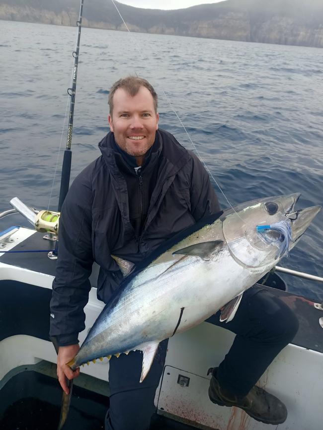 Rodney Dann, of Richmond, lands a bluefin tuna on a Personalised Sea Charters trip over Easter.